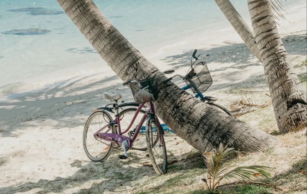 Cycling on Matira beach, Bora Bora © Marc Gérard Photography