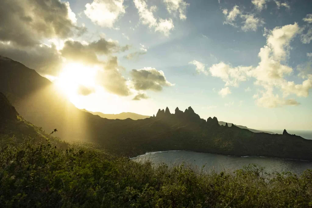 Mountainous landscape with a sunset at Nuku Hiva © Grégoire Le Bacon