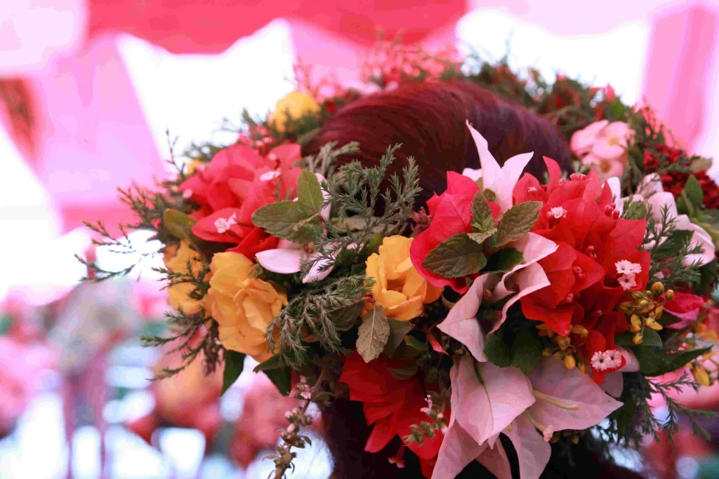 The people of Rurutu adorn themselves with fragrant flower wreaths © Evaina Teainore